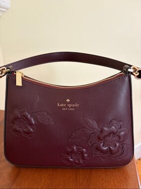Unique kate spade New York Maroon Floral Embossed Leather Shoulder Bag.